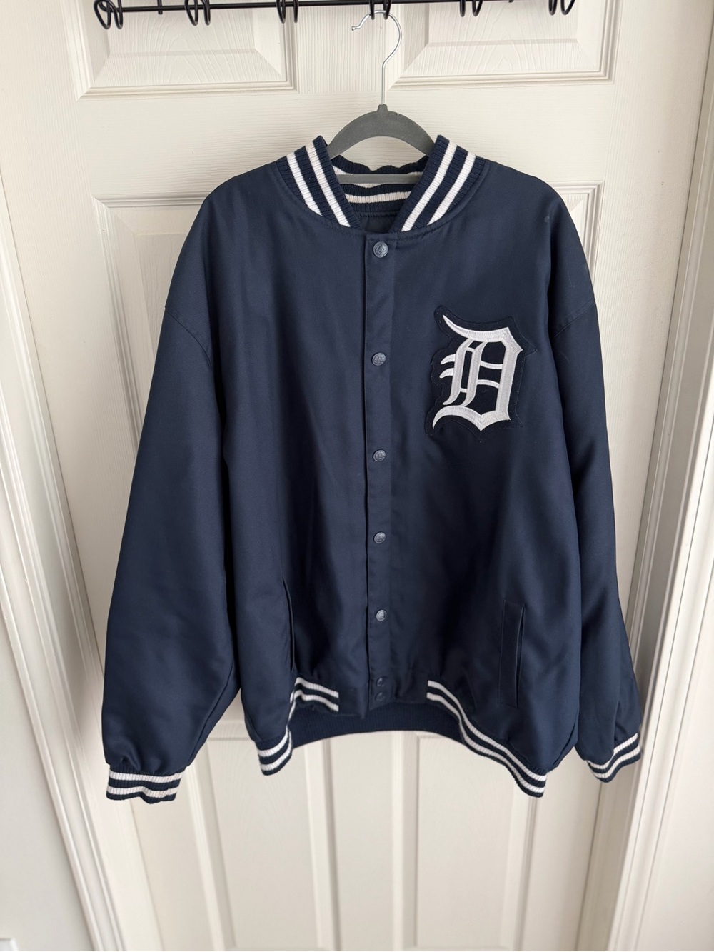 Genuine Merchandise Navy Jacket with White Trim and Chest Applique